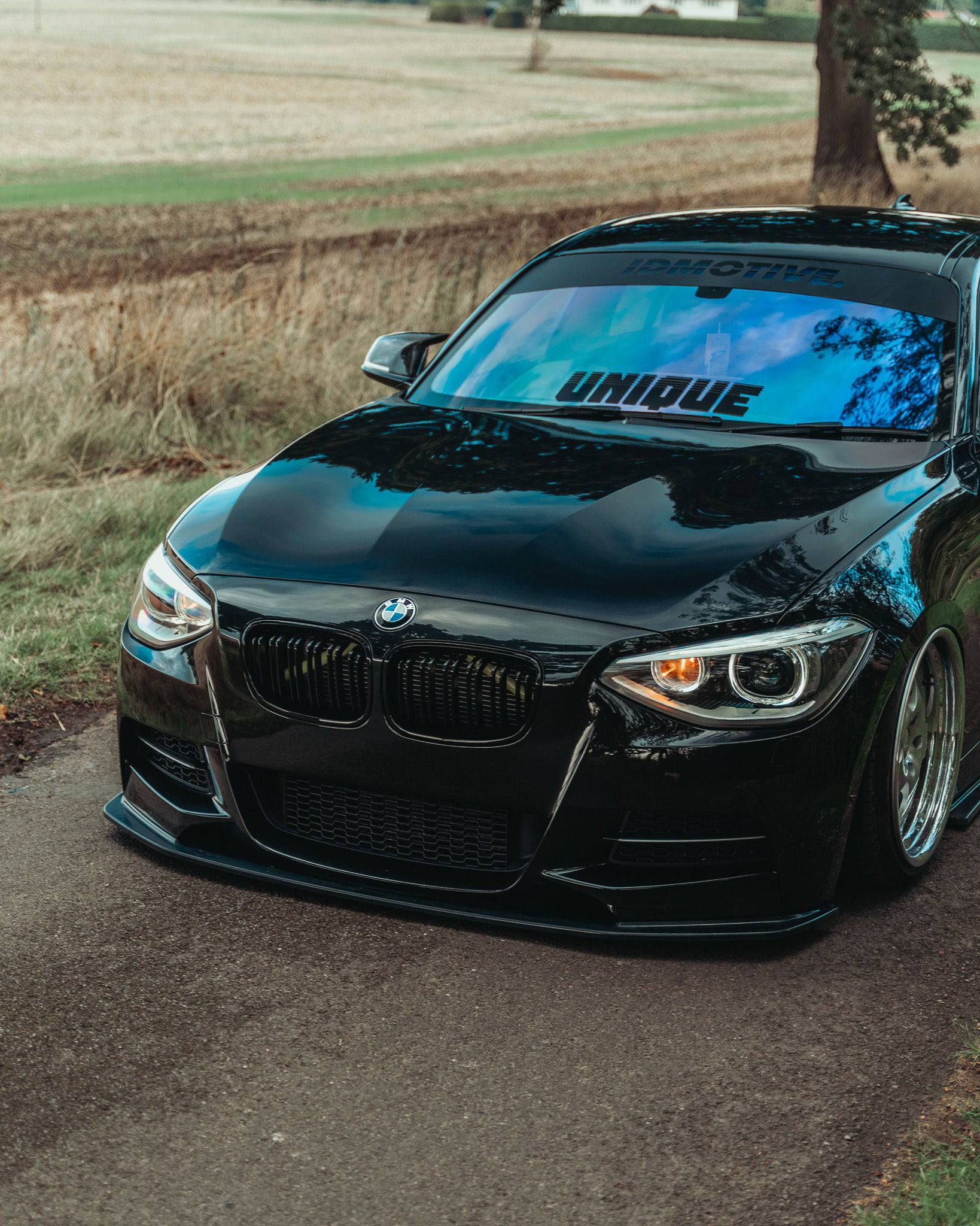 BMW 1 Series F20 Pre - LCI EVO - 1 Gloss Black Front Splitter by ZAERO (2011 - 2015) - Evolve Automotive